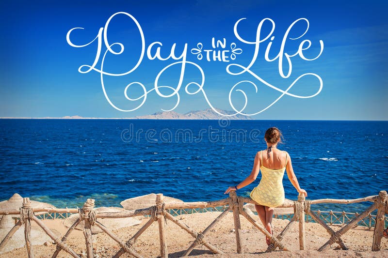 Woman sitting looking at the sea and text Day in the life. Calligraphy lettering vintage hand draw stock image Woman sitting looking at the sea and text Day in the life. Calligraphy lettering vintage hand draw stock image