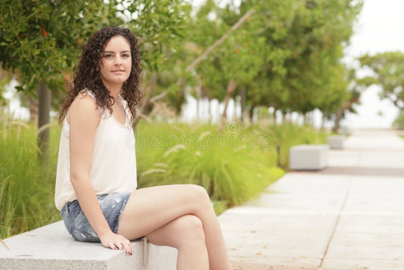 Woman sitting on a park bench