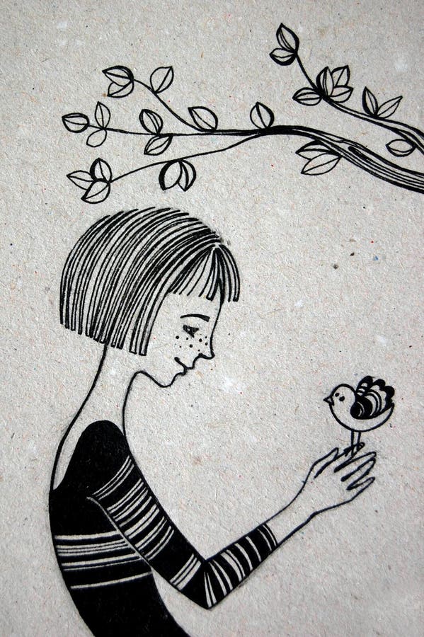 Woman sitting on the tree holding bird in hand