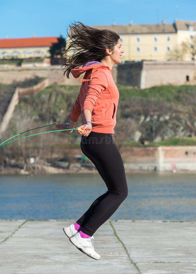 Woman with skipping rope stock image. Image of exercise - 41407773