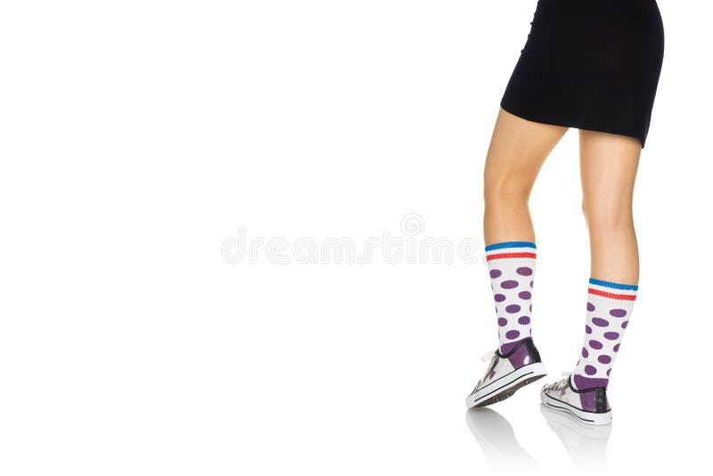 Woman in a Skirt Wearing Transparent Summer Shoes and Colorful Sock ...