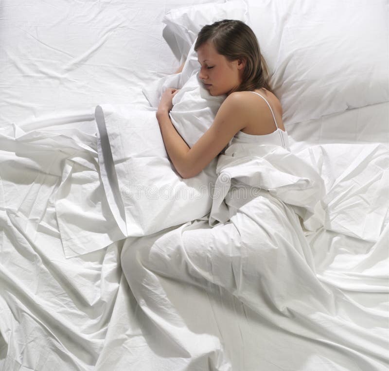 Woman sleeping in the bed stock photo. Image of cleanliness 8317948