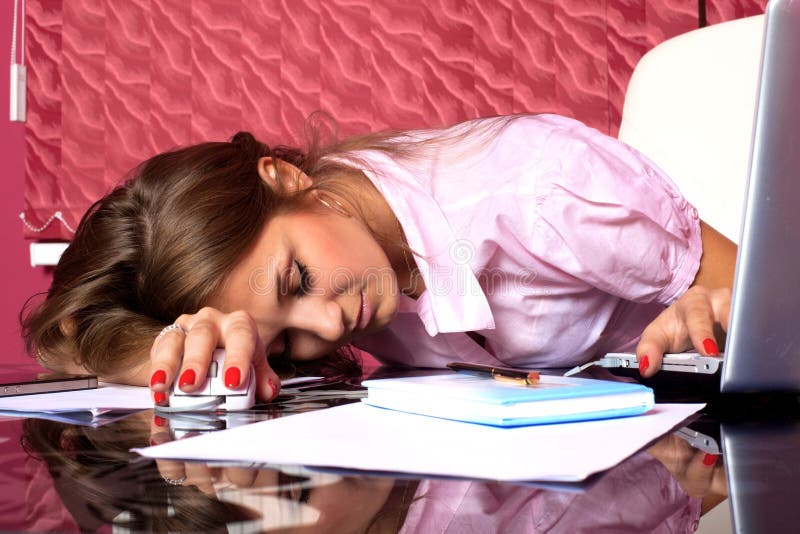 Woman sleeping at the PC