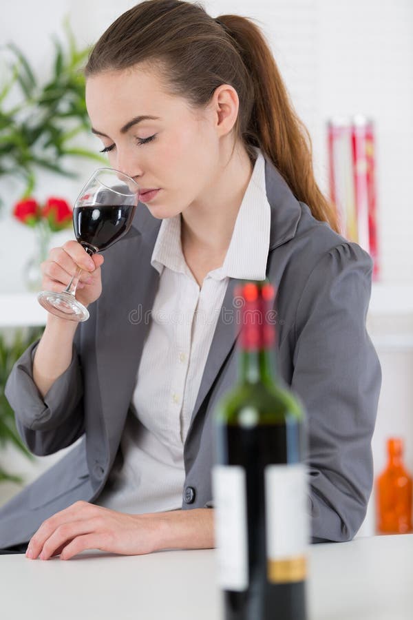 Woman smelling aroma wine royalty free stock photo