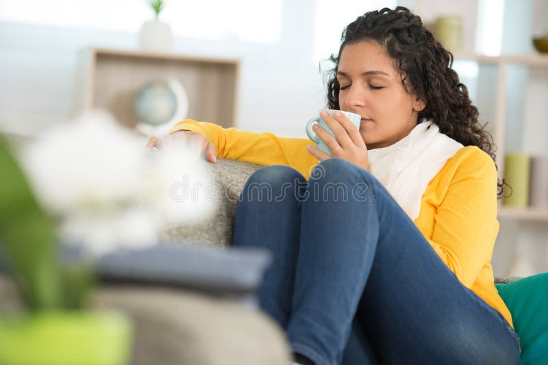 Woman smelling coffee royalty free stock images