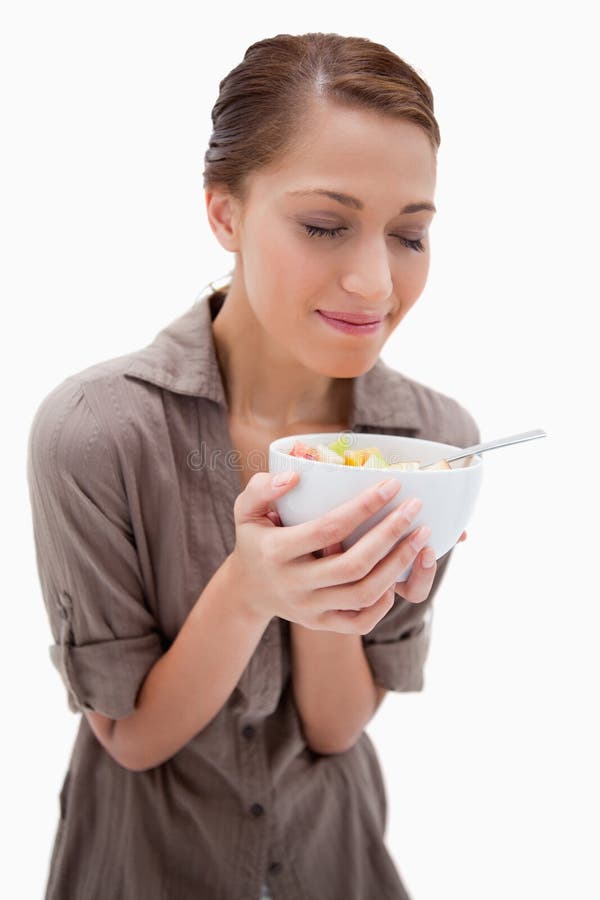 Woman Smelling Her Bowl Fruit Salad Stock Photos Free & RoyaltyFree