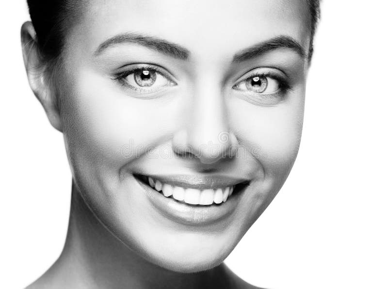 Woman smile. Teeth whitening. Dental care.