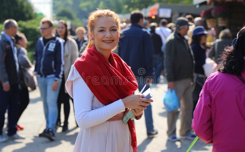 Woman smiling to the days of Bucharest celebration