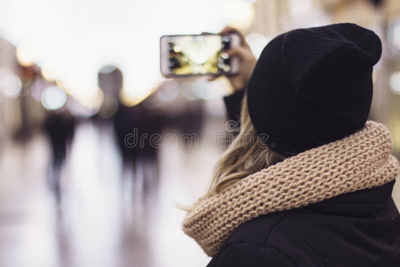Woman snapping photo stock photos Woman snapping photo stock photos