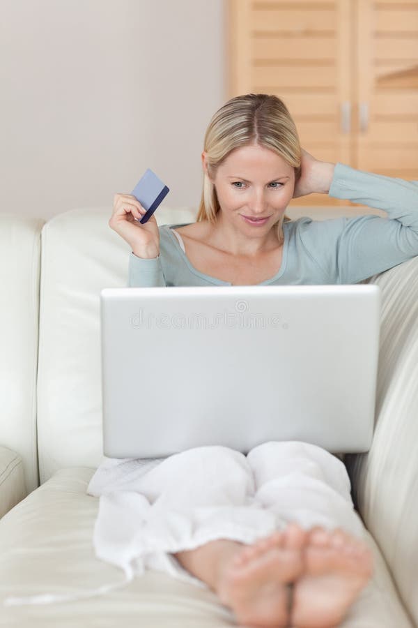 Woman on the Sofa Hunting Bargain Online Stock Photo Image of credit
