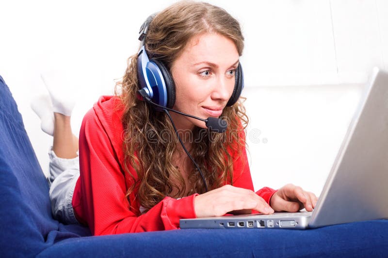 Woman on sofa with laptop