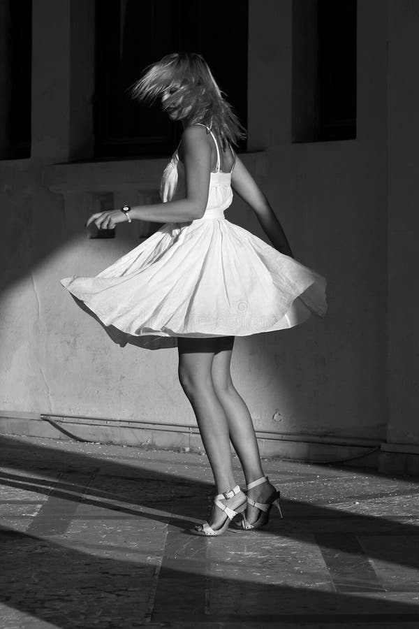 Woman spinning in a dress stock photo. Image of caucasian 21503682