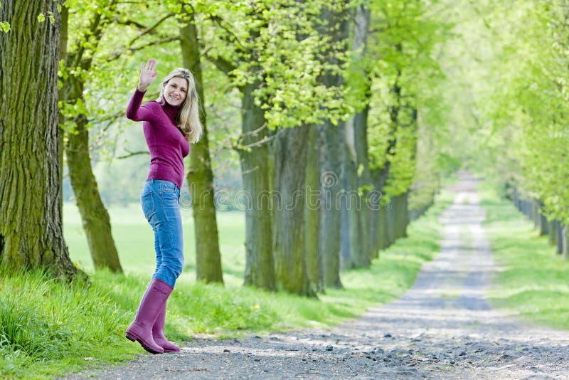 Woman in spring alley