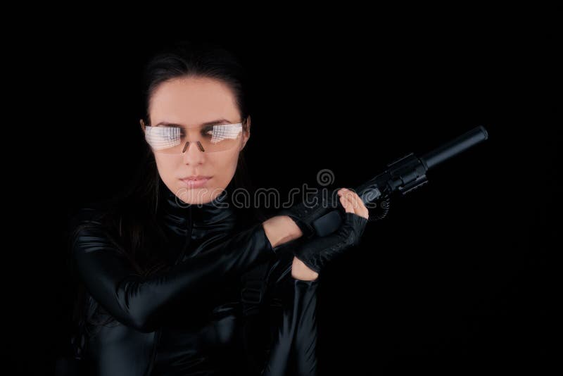 Woman Spy Holding Gun stock image. Image of dark, costume 40412317