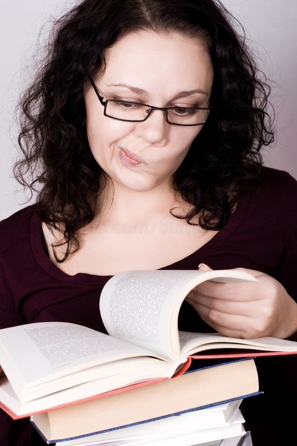 Woman with stack of books