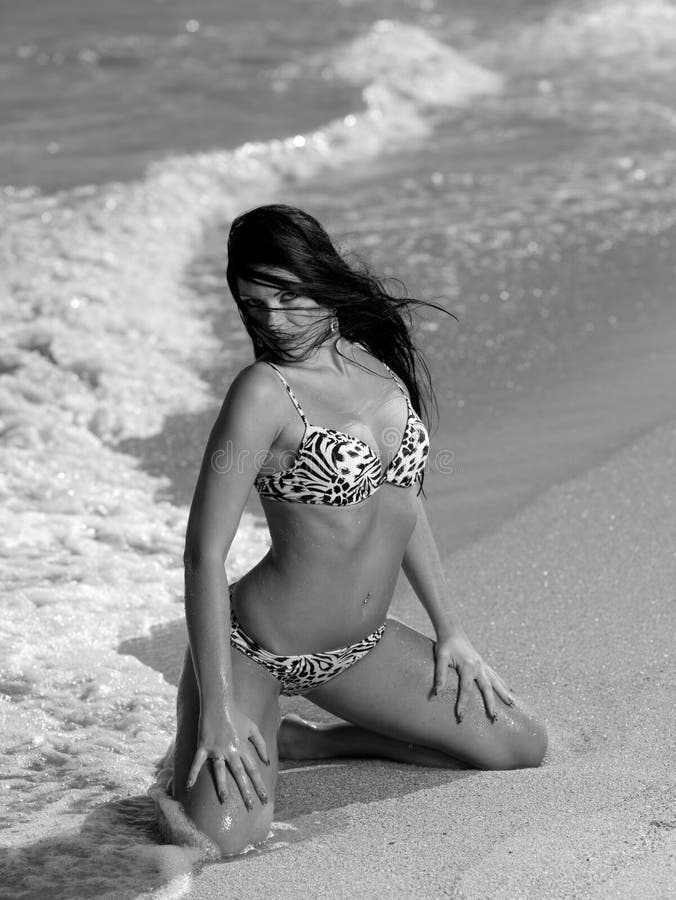 Woman standing on the beach