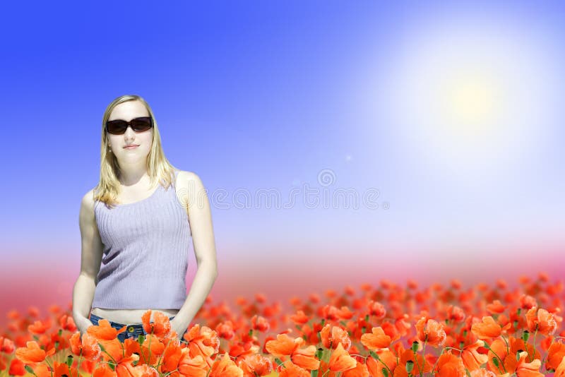 Woman standing on poppy flowers field