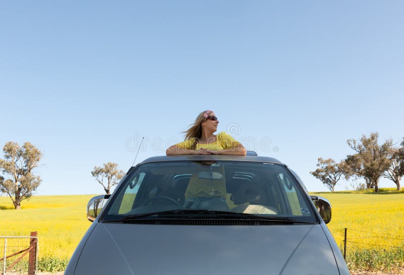 Young Woman Poses For A Photograph Near A Car High-Res Stock Photo - Getty  Images