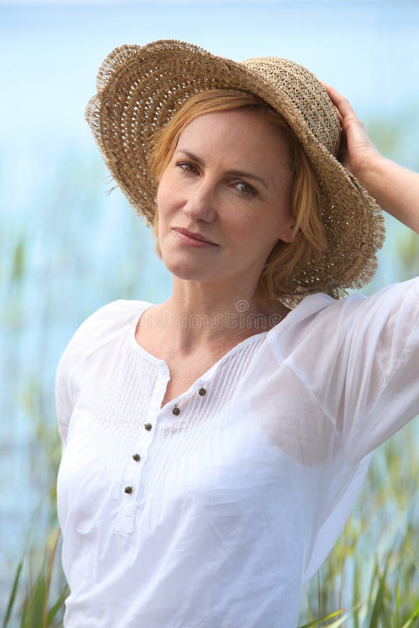 Woman with Straw Hat stock image. Image of draft, natural 35922447