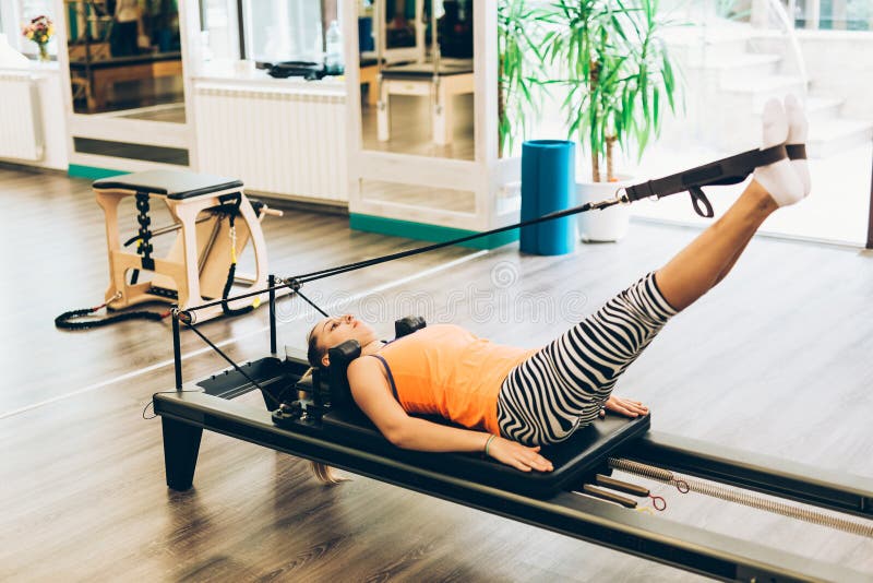Woman Stretching in Pilates Reformer Stock Photo Image of diet