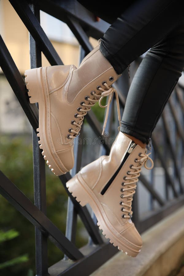 Woman in Stylish Leather Boots and Jeans Outdoors. Close Up of Female ...