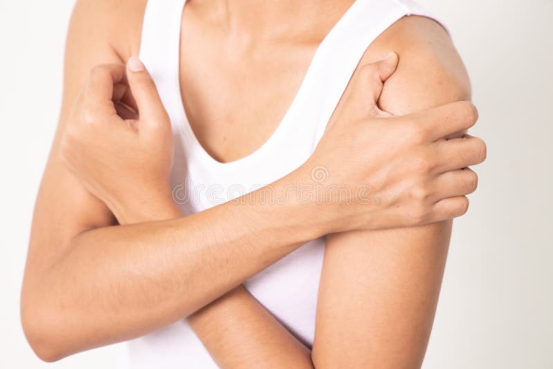Arms Pain. Beautiful Woman Suffering From Painful Feeling In Arm Muscles.  Closeup Of Female Body Feeling Pain In Shoulders, Touching Injured Arm With  Hand. Injury, Health Care Concept. High Resolution Banco de