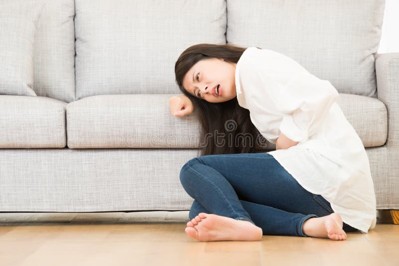 Woman suffering sickness stomach ache pain stock photos Woman suffering sickness stomach ache pain stock photos