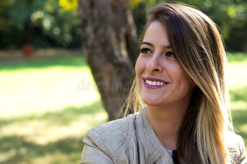 Woman sunny nature portrait, feeling happiness