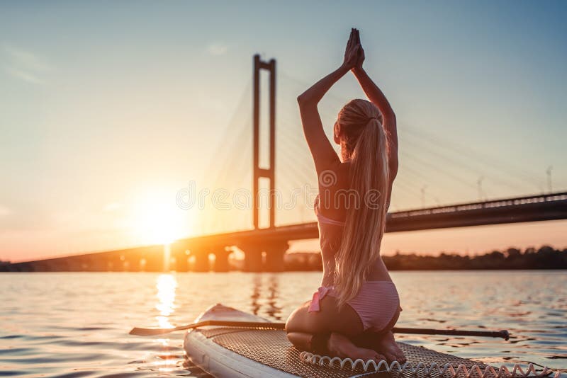 Woman on SUP board