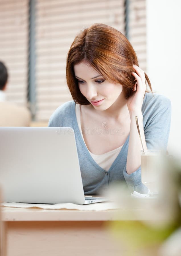 Woman is surfing on the internet royalty free stock photos Woman is surfing on the internet royalty free stock photos