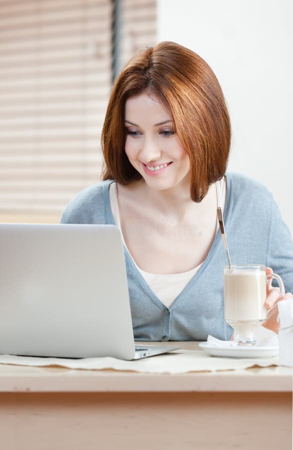 Woman is surfing on the internet on the pc royalty free stock photos Woman is surfing on the internet on the pc royalty free stock photos