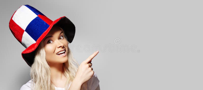 Woman surprise showing something. Smiling Football Fan Face. Woman Expressing Emotions of Joy. Russian Team Supporter stock photos Woman surprise showing something. Smiling Football Fan Face. Woman Expressing Emotions of Joy. Russian Team Supporter stock photos