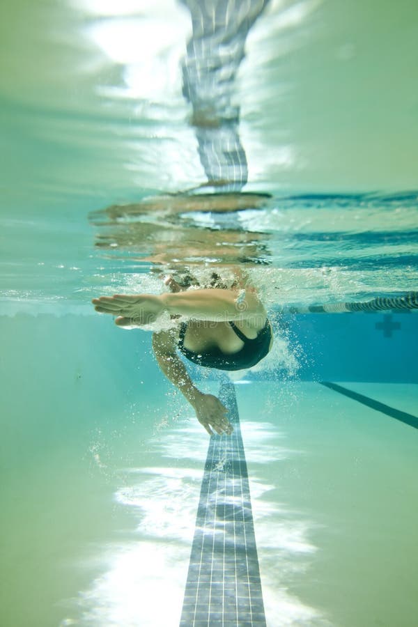 Boy swimming laps stock image. Image of bubble, swim 12625729