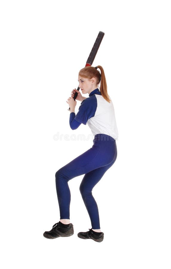 a Woman bat swinging softball