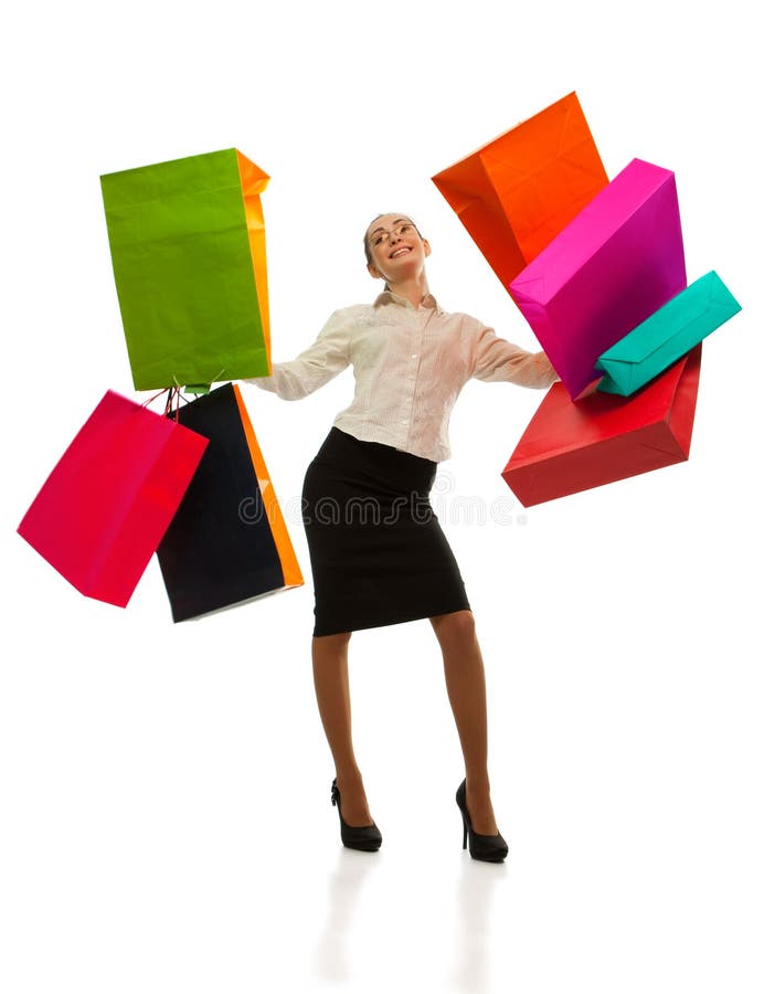 Woman swinging with shopping bags