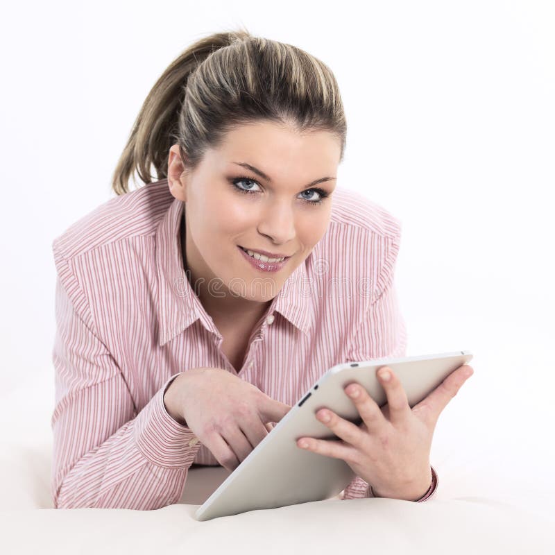 Woman on sofa with tablet stock photo. Image of interior - 18752628