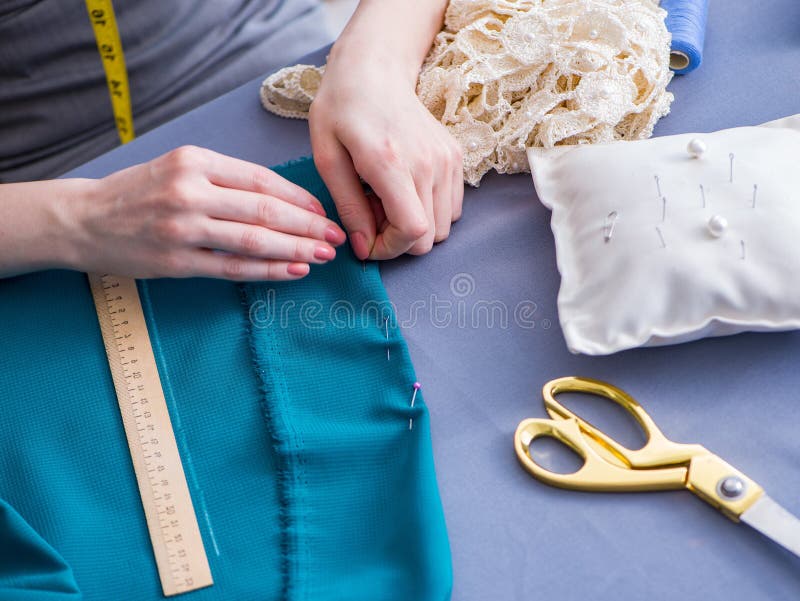 Woman Tailor Working on a Clothing Sewing Stitching Measuring Fa Stock ...