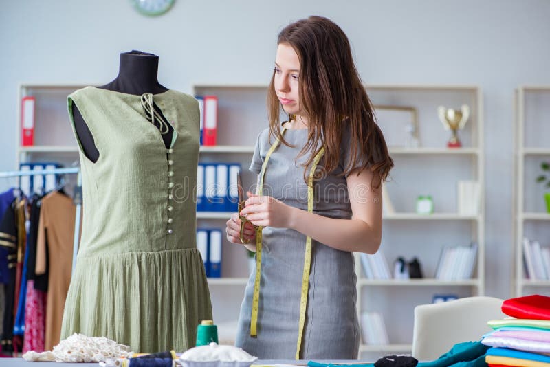 Woman Tailor Working on a Clothing Sewing Stitching Measuring Fa Stock ...