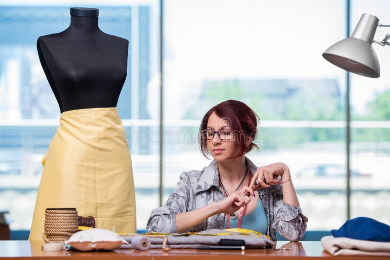 The Woman Tailor Working at Her Desk Stock Photo Image of adult