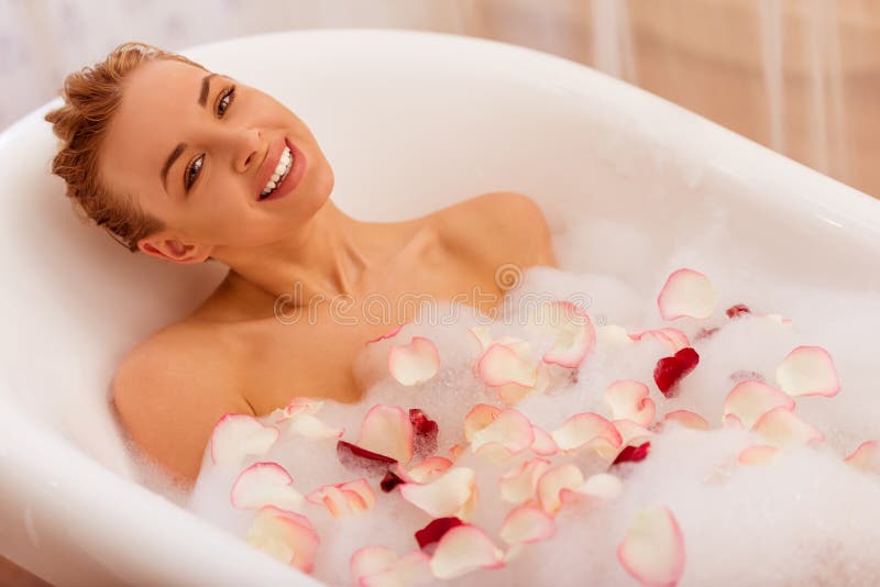 Woman taking a bath stock photos Woman taking a bath stock photos