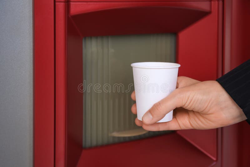 Woman Taking Paper Cup with Coffee from Vending Machine, Closeup Stock Photo Image of female