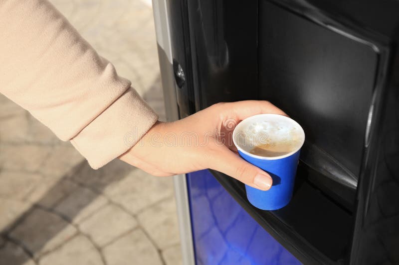 Woman Taking Paper Cup with Coffee from Vending Machine Outdoors, Closeup Stock Photo Image of