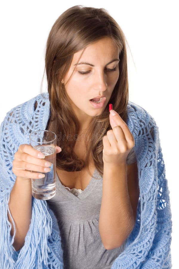 Woman taking pill