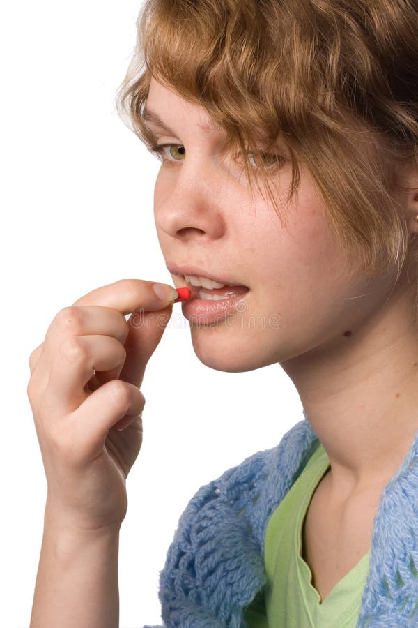 Woman taking pill