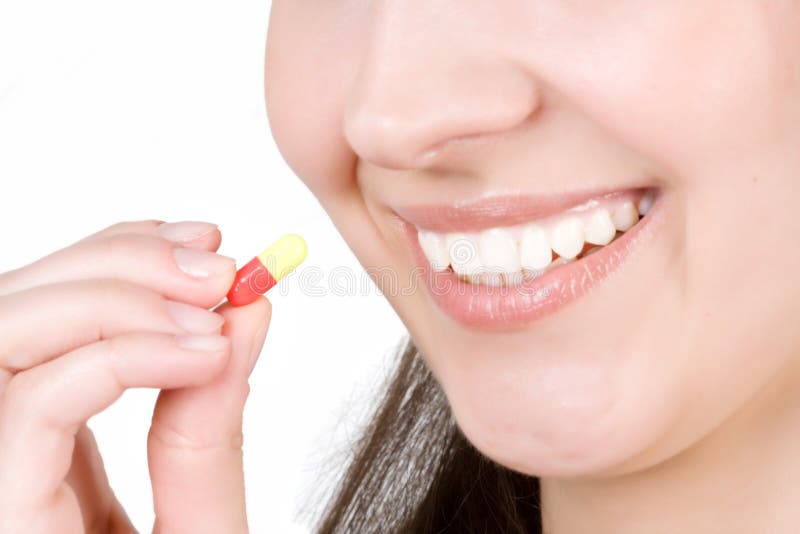 Woman taking pill