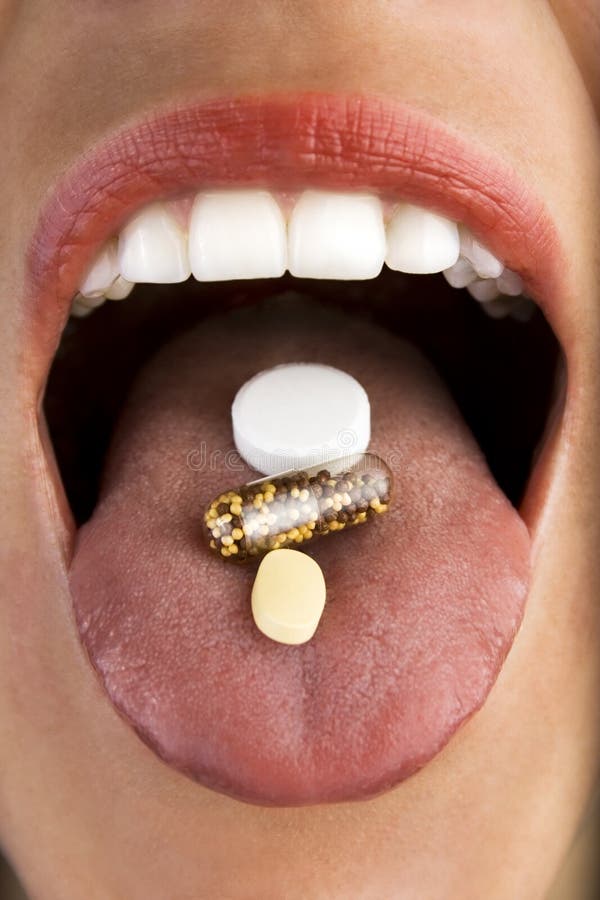 Woman taking pills