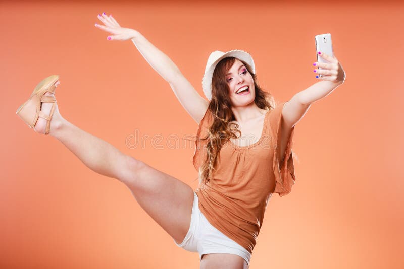 Woman taking self picture with smartphone camera royalty free stock images Woman taking self picture with smartphone camera royalty free stock images
