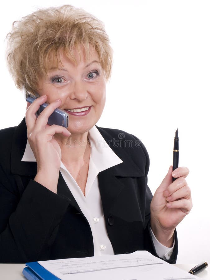 Woman talking by mobile phone royalty free stock photography
