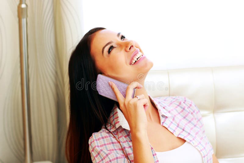 Woman talking on the phone stock photography