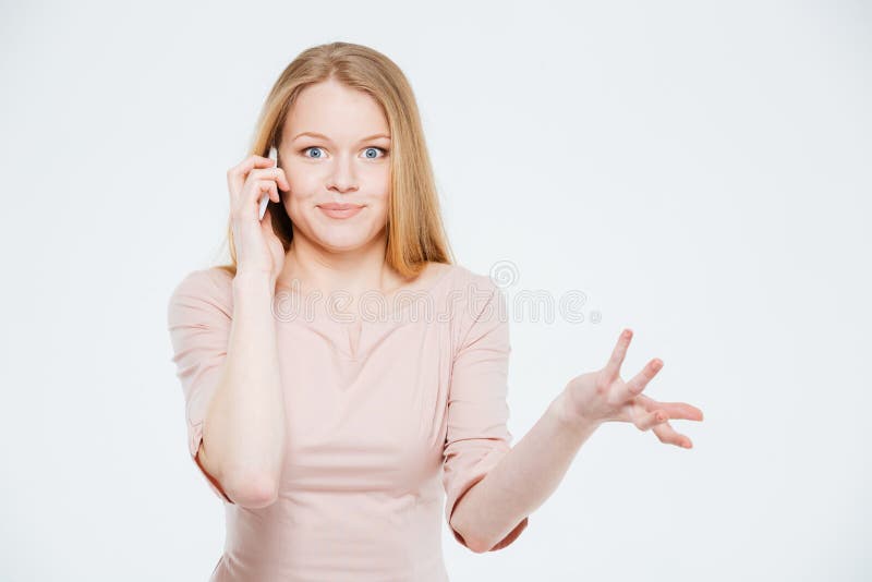 Woman talking on the phone and shrugging shoulders royalty free stock images